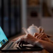 woman typing on a laptop